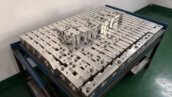 Batch of repeat-production CNC machined metal components