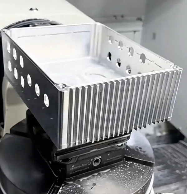 CNC machined finned housing for thermal management applications