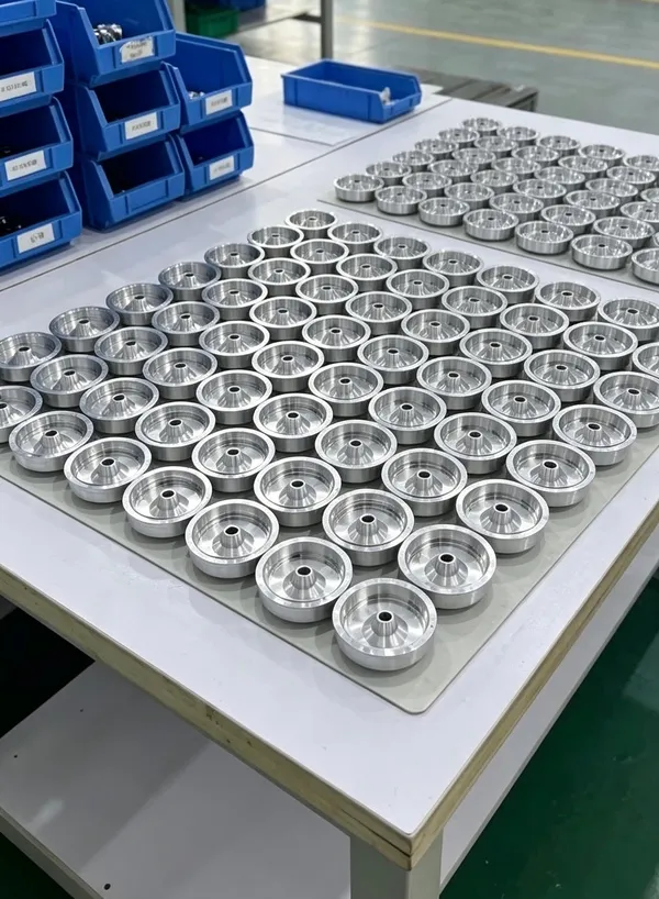 Batch of repeat-production CNC machined round components